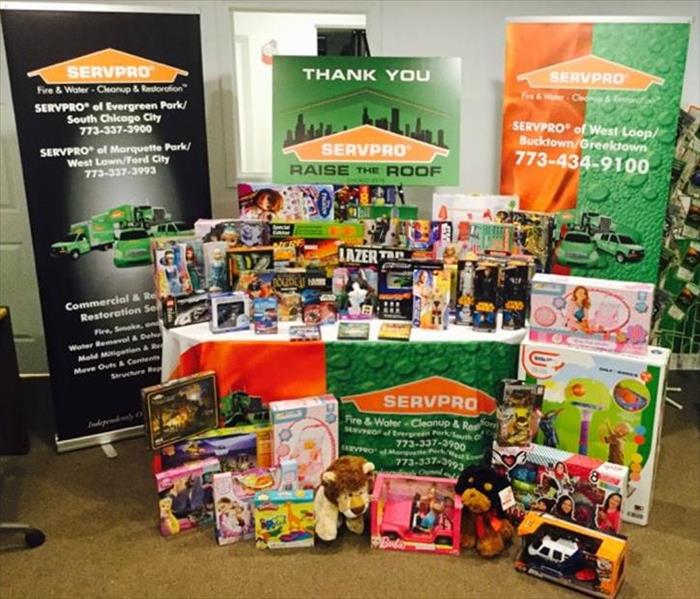 SERVPRO banners and table with toys on and around the table