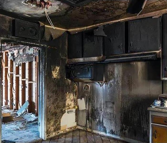 Fire and soot damage to kitchen cabinets 