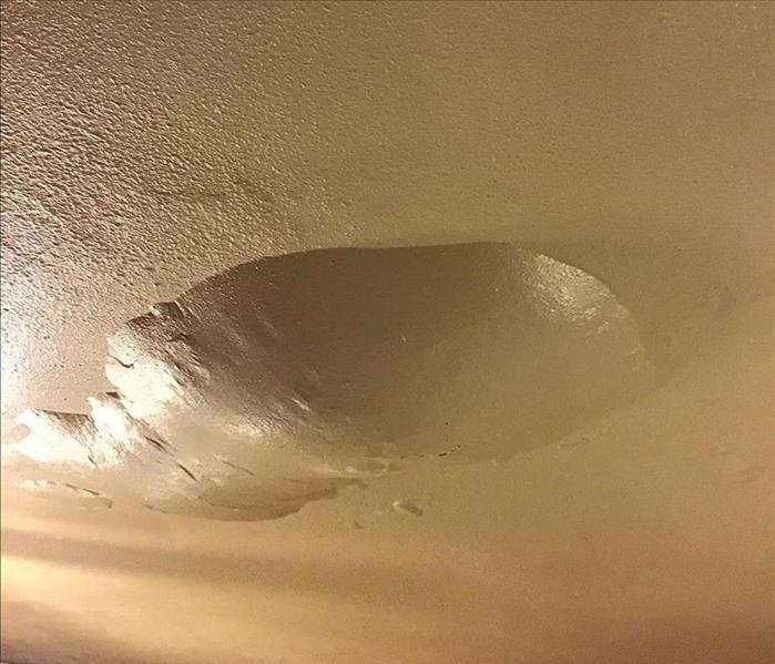 Ceiling with a paint bubble