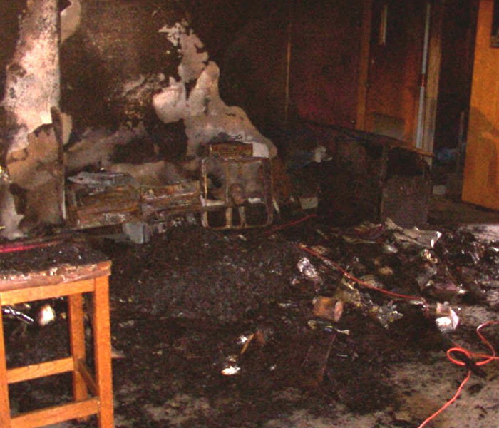Soot and fire damage in a living room