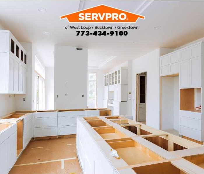 A kitchen is reconstructed after sustaining fire damage.