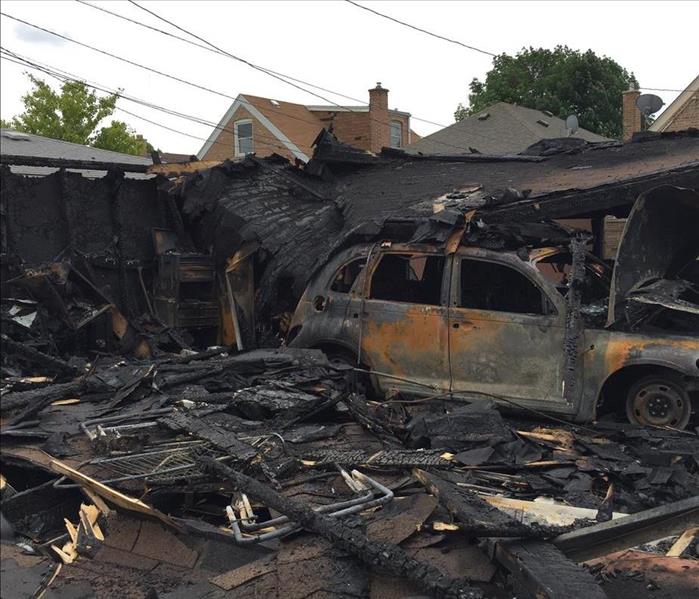 burned down garage and car